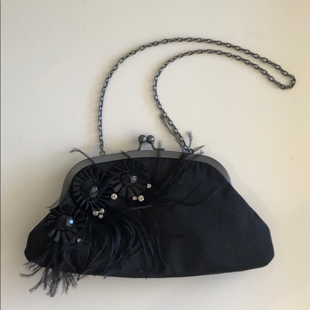 Black formal evening clutch. Feathers rhinestones.